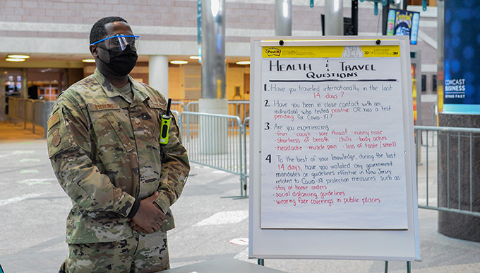 An image of a N.J. Air National Guard member serving at the Atlantic City Convention Center, N.J., which has been set up as a COVID-19 vaccination point of distribution center in Atlantic County